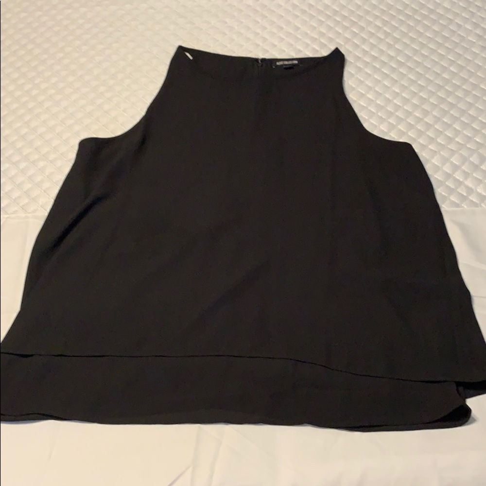 Dressy black tank/blouse.Flows and hangs beautiful